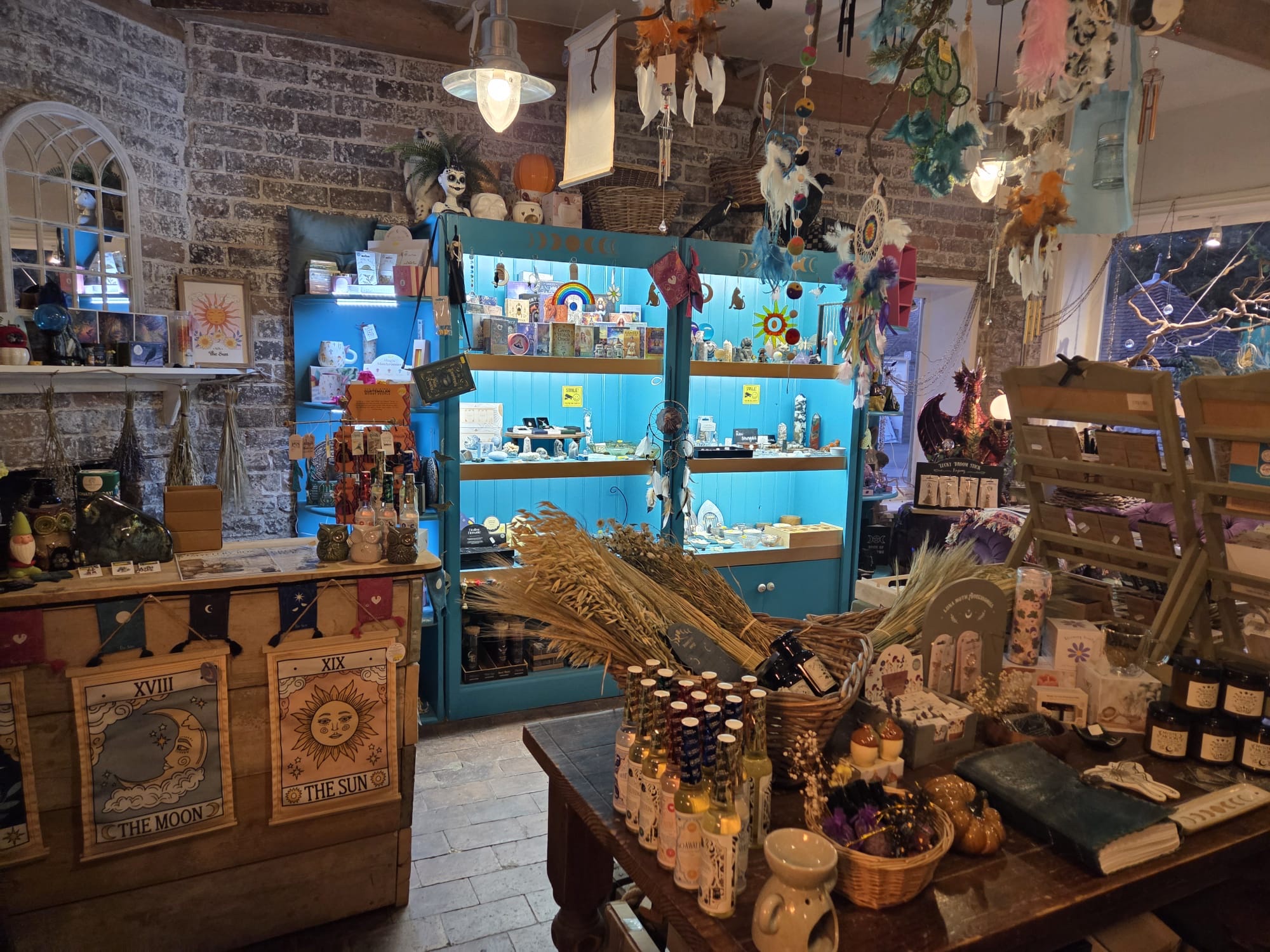 The crystal cabinet and moon display inside the shop